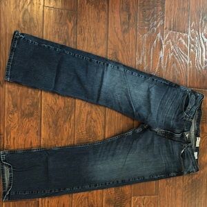 Wrangler Blue Relaxed Jeans with Distressed Look